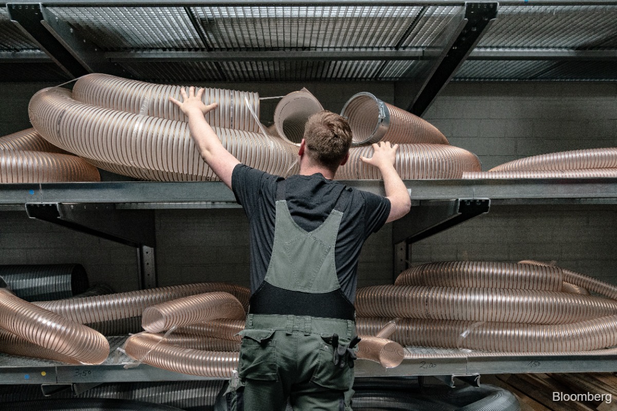 German industry output unexpectedly drops most in almost a year